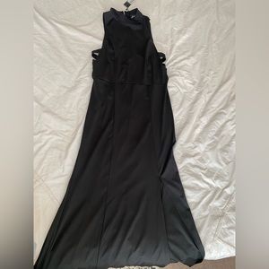 XL long black high neck cutout sides floor length gown worn a slit
